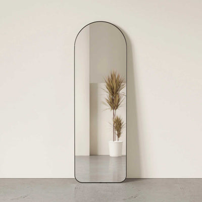 Umbra Hubba arched leaning mirror, metallic titanium