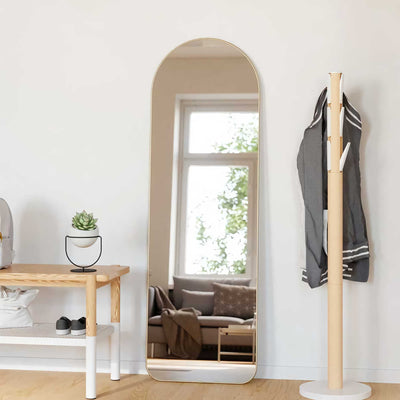 Umbra Hubba arched leaning mirror, brass