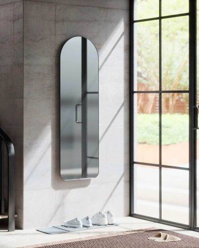 Umbra Hubba arched leaning mirror, metallic titanium