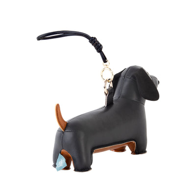 Zuny Teckel bag charm, black/tan