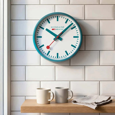 Mondaine wall clock ø25, transformative teal limited edition