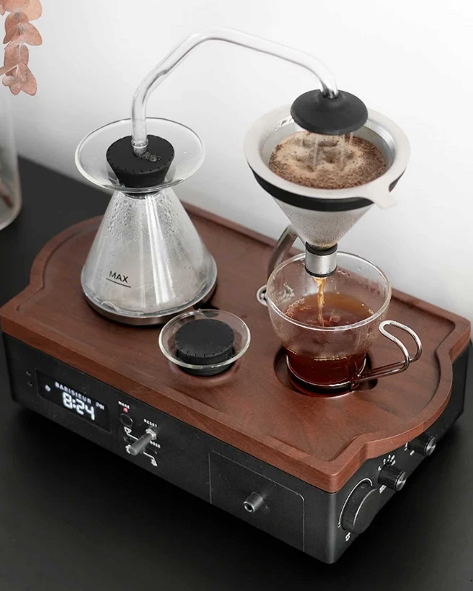 Barisieur 2.0: an alarm clock that makes us coffee or tea and wirelessly  charges the device.